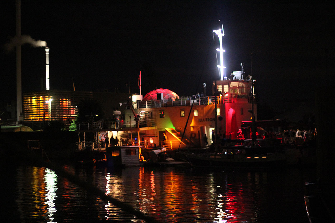 Illutron floating cultural platform illuminated at night